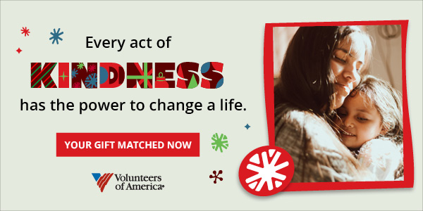 Photo of mom hugging her daughter, both smiling and content.