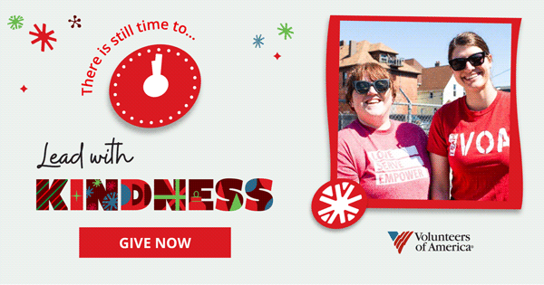 Photo of VOA staff smiling and posing outside program.