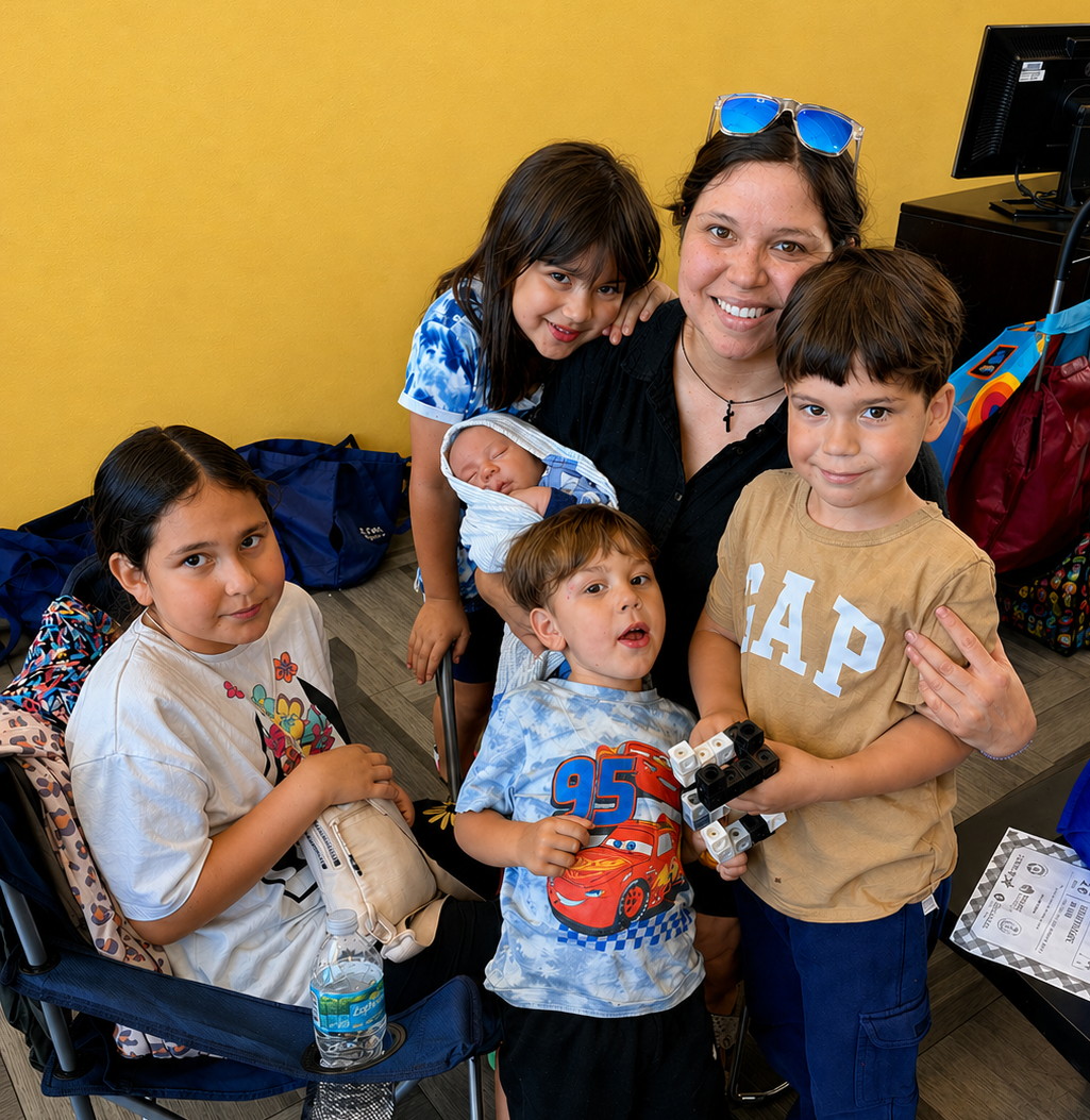 Sofia smiling with her 5 adorable children