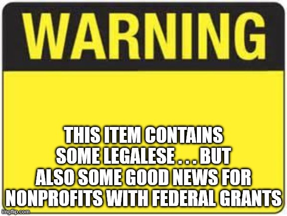 Yellow and black 'Warning' sign that reads 